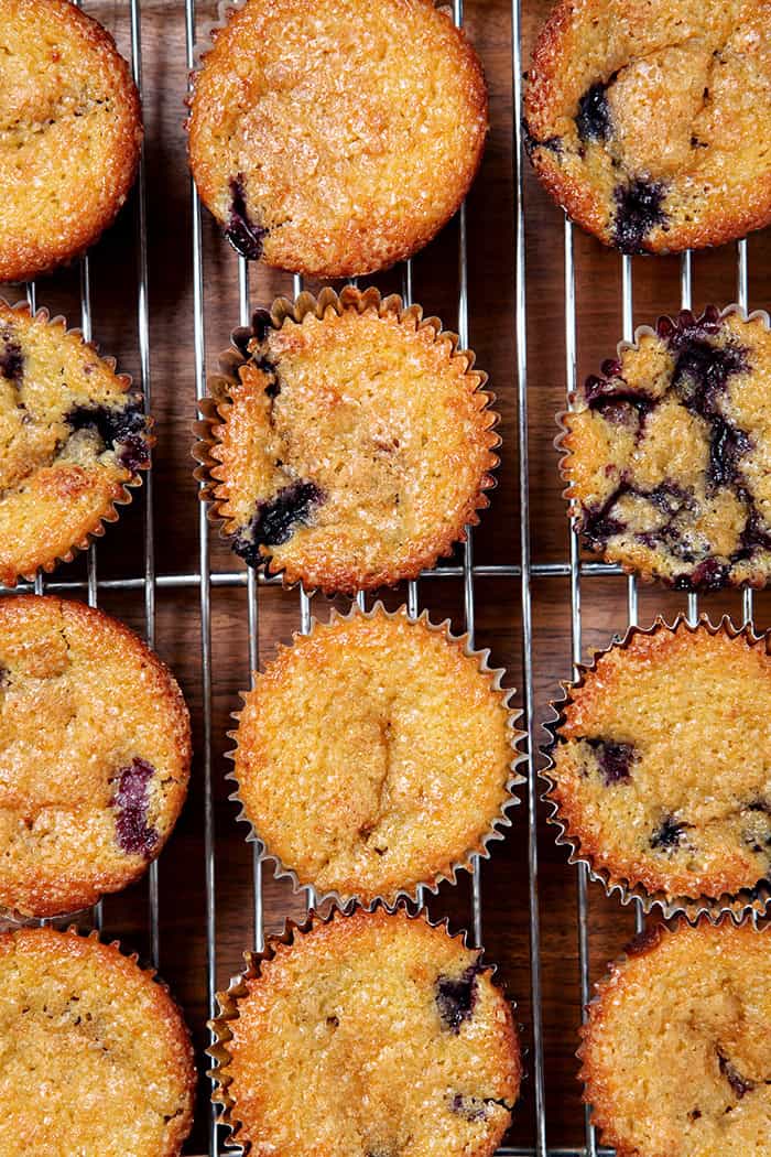 Blueberry Orange muffins on a cooling rack.