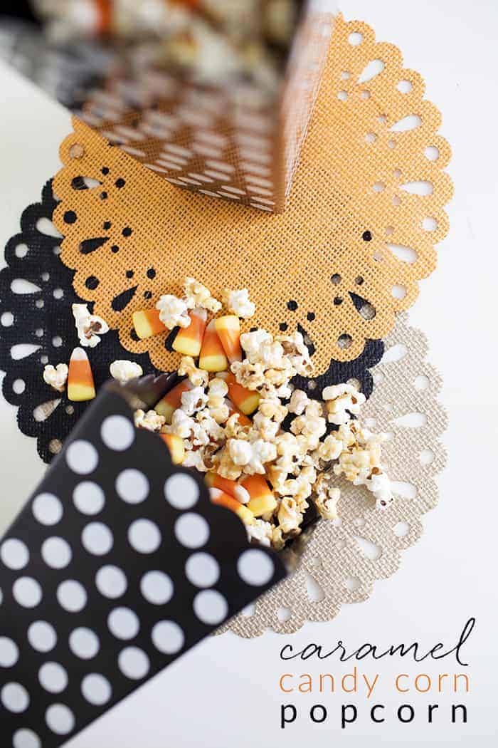 Candy corn caramel popcorn in a polka dot paper bag.