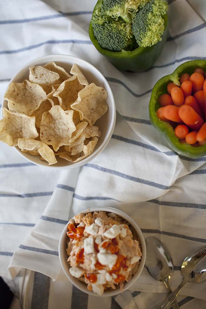Super easy and quick buffalo chicken dip recipe. The perfect appetizer for the Big Game! 
