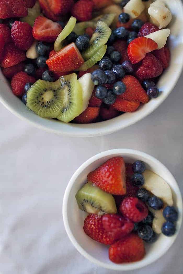 A bowl of kiwi and blueberries, perfect for a New Mothers Spring Brunch Party.