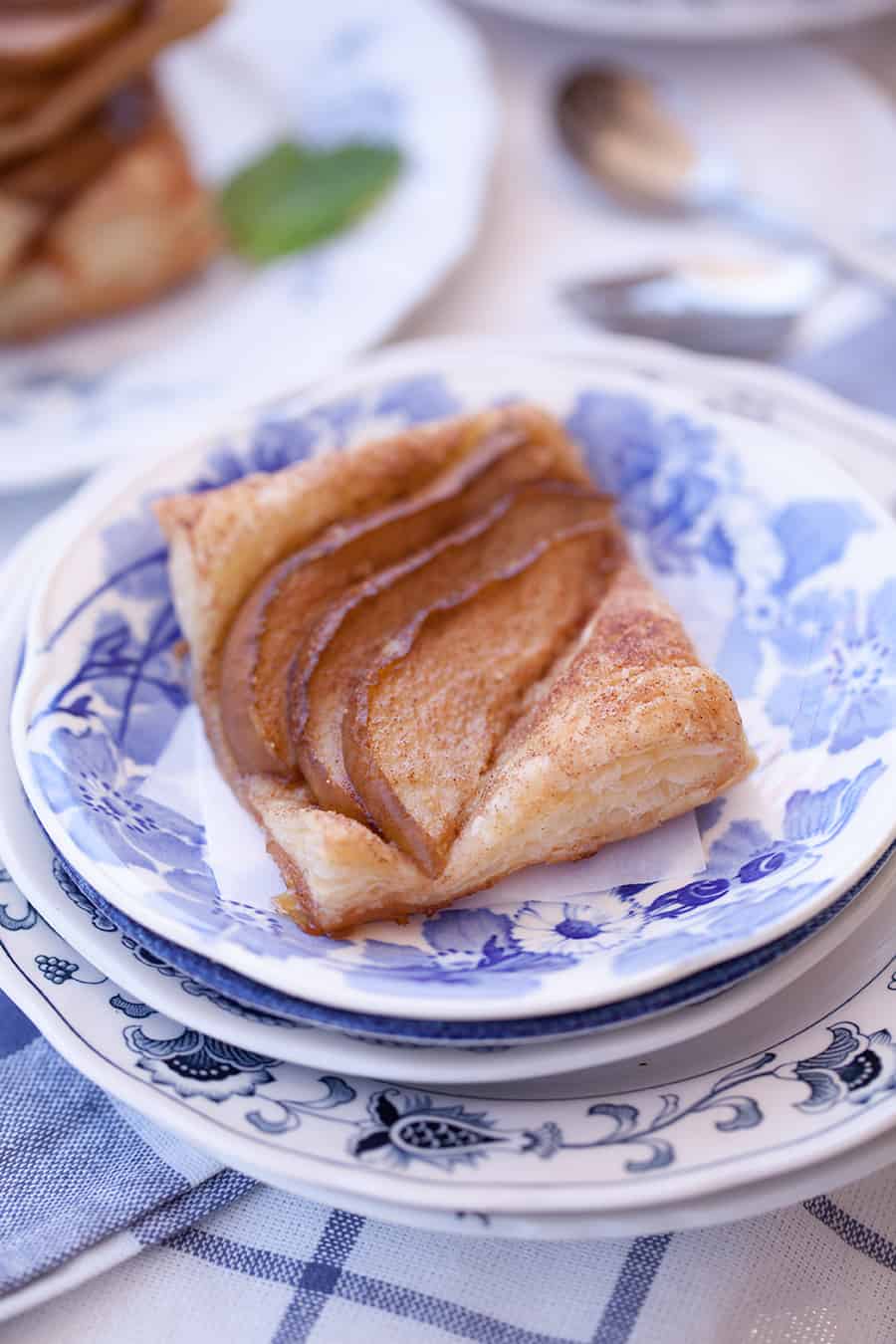 This cinnamon sugar pear tart is the perfect quick dessert idea. Just thaw a store bought pastry puff, season and add pears. Delicious dessert in under 30 minutes!