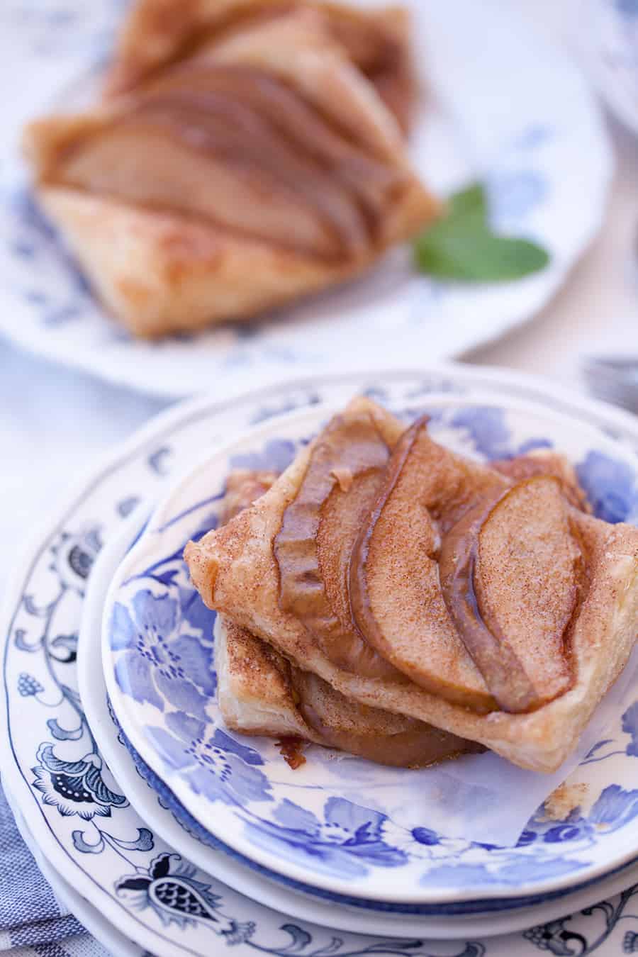 This cinnamon sugar pear tart is the perfect quick dessert idea. Just thaw a store bought pastry puff, season and add pears. Delicious dessert in under 30 minutes!