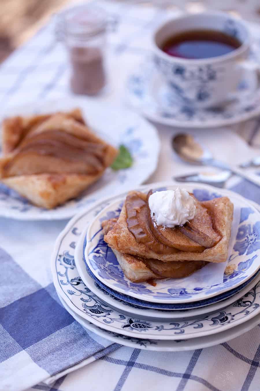 This cinnamon sugar pear tart is the perfect quick dessert idea. Just thaw a store bought pastry puff, season and add pears. Delicious dessert in under 30 minutes!