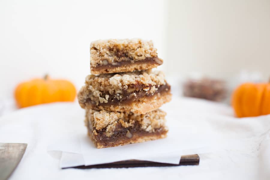 These pecan pie crumble bars are perfect for the holidays or when you need a little holiday spirit any time of the year! These bars have a shortbread pie like crust, gooey pecan pie filling, and the easiest crumble topping. 