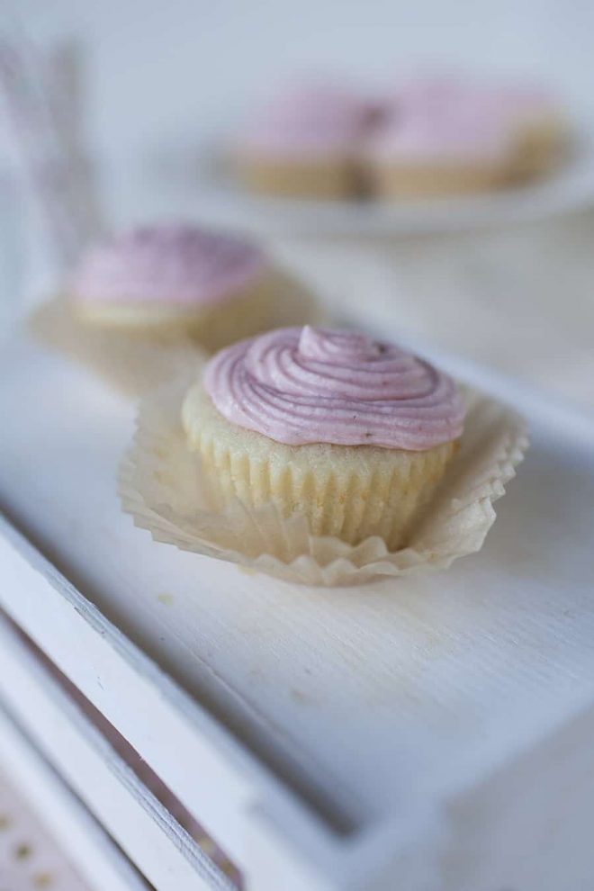 These sweet strawberry buttercream cupcakes are the perfect treat! The light and airy vanilla cupcake base is perfectly paired with the sweet strawberry buttercream icing!