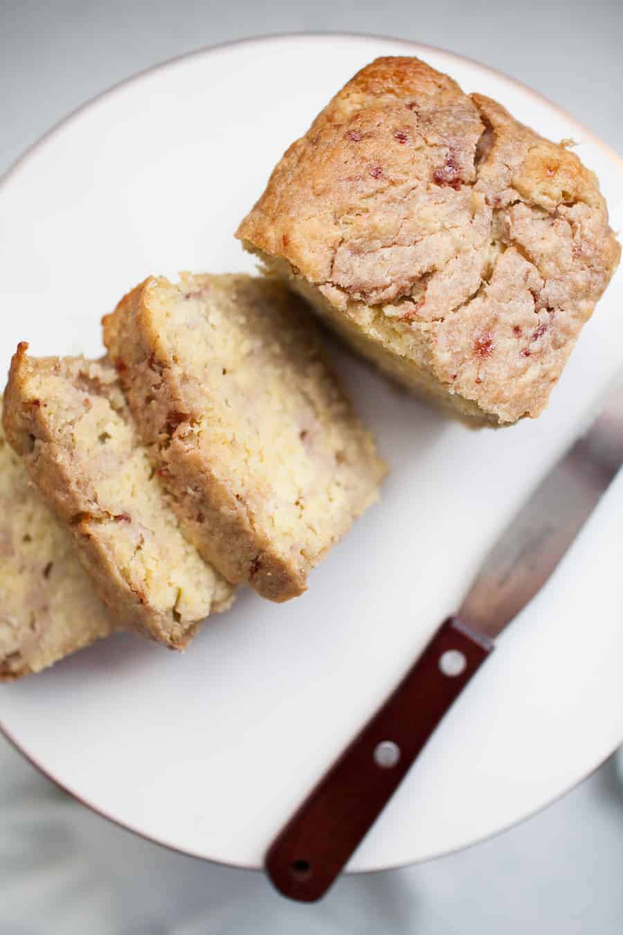 This strawberry jam quick bread is a special treat that the whole family can enjoy! Made with honey sweetened jam, it?s the perfect little indulgence. Make mini loaves and give them as gifts!