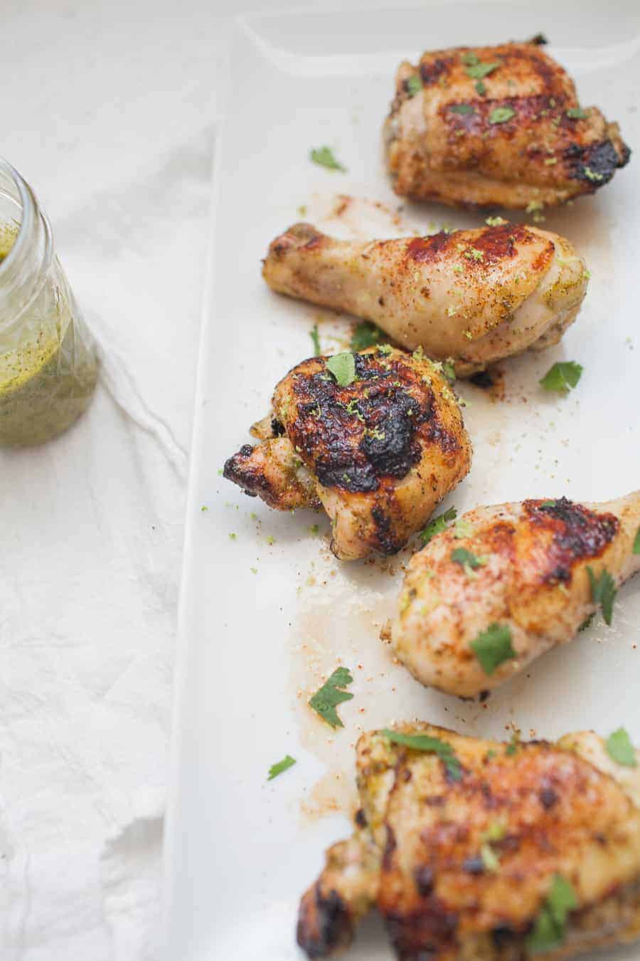 Grilled chicken is a staple of warmer weather! This grilled chili cilantro lime chicken will get dinner on the table in a hurry for your family and it will be packed with flavor! healthy grilled chicken | grilled chicken marinade | homemade marinade | chile lime chicken | cilantro lime chicken | lime grilled chicken 