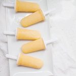 These healthy peach lemonade popsicles are the perfect summer treat! Cool down with these refined sugar free, creamy, fruity pops.