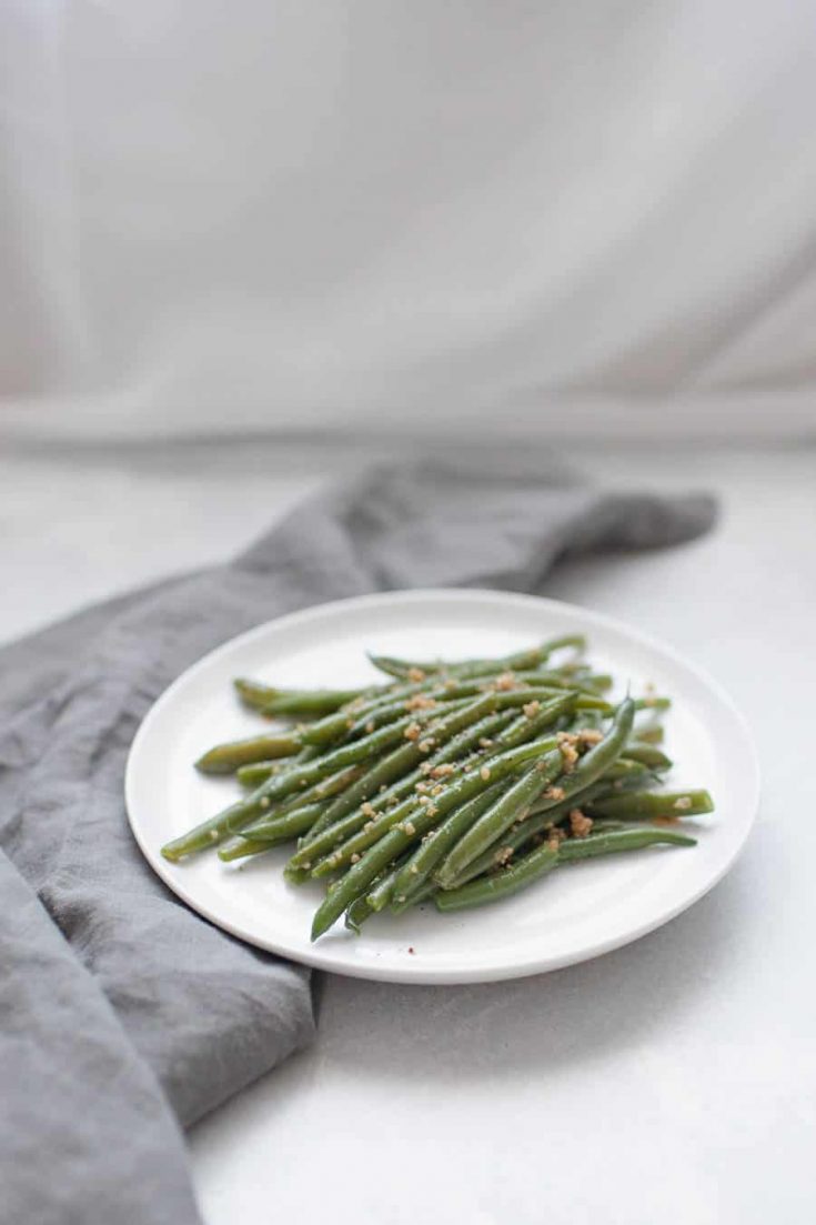 Garlic brown butter green beans are the perfect vegetable staple for your home. These green beans go with so many entrees and they are so easy to make, whether it's with fresh or frozen green beans. Even your kids will love these flavorful vegetables.?