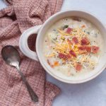 Quick soups are the best lunch or dinner option for the cooler months! Warm up with a bowl of this quick, loaded baked potato soup that is packed with veggies and toppings. This quick soup has a broth base which makes it lighter than other heavy potato soups. This lighter baked potato soup option is perfect for a hearty meal that won't weigh you down but definitely does not skimp on flavor!
