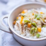 This five ingredient Salsa Verde Chicken is an easy weeknight slow cooker meal the whole family will love! It's made with jarred salsa verde, chicken, bell peppers, onions and rice and it's ready in a matter without even thinking about it.?