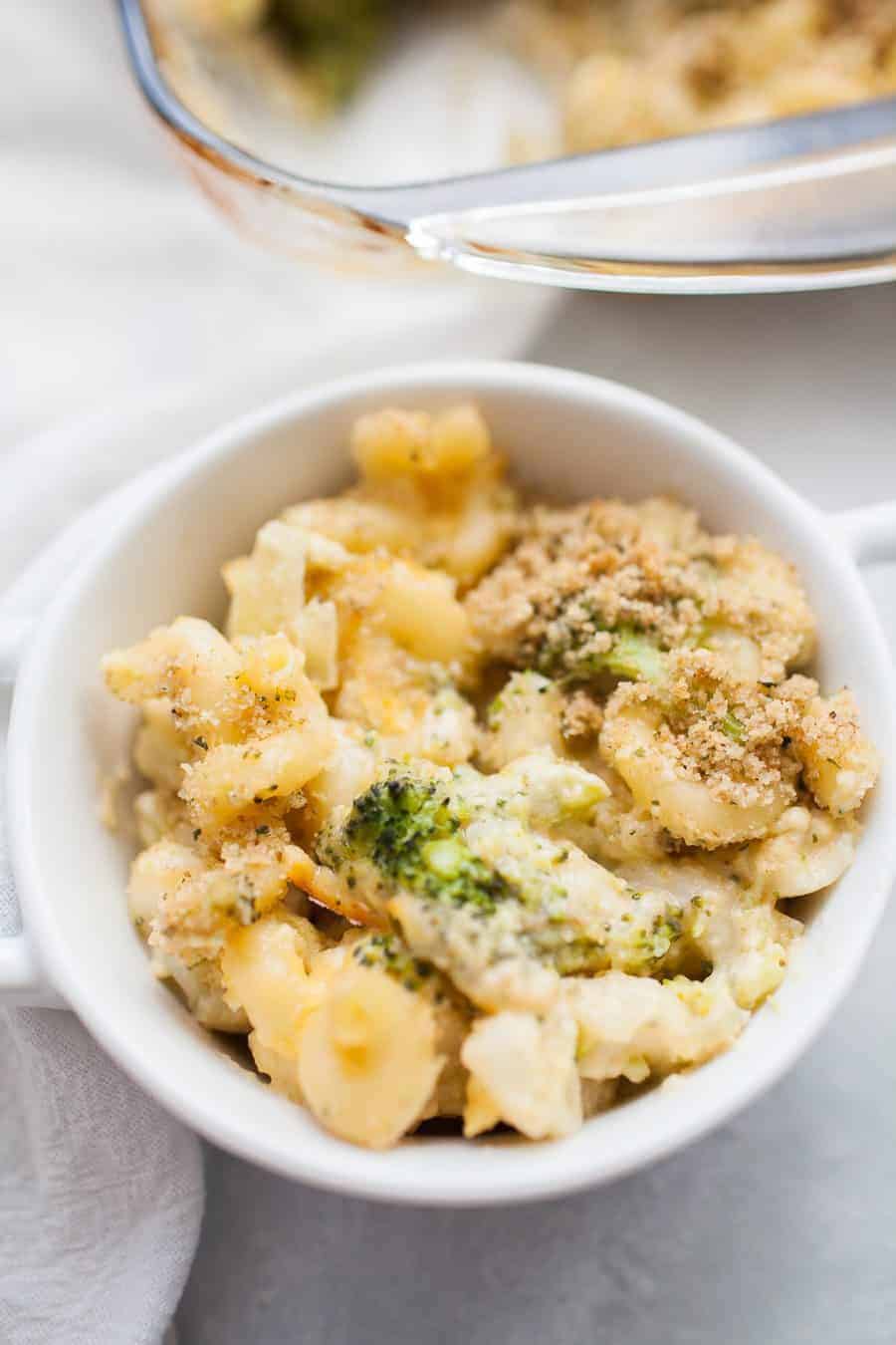 Homemade baked macaroni and cheese is a recipe every one should know how to make! If you enjoy eating mac and cheese, and who doesn't, this is a recipe you've got to try! It's perfect for weeknight dinners, bringing to a friend, or serving to the whole family! This homemade broccoli macaroni and cheese is made with corkscrew pasta, homemade cheese sauce, broccoli and finished with a bread crumb topping.?