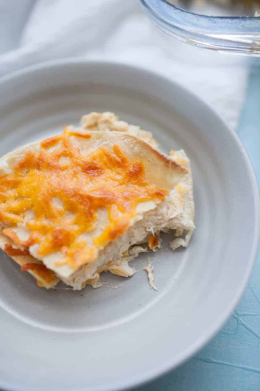 This Chicken Mushroom Enchilada Casserole is a hearty entree packed with flavor from shredded chicken, mushroom, onions, sour cream, and cream of mushroom. Perfectly for sharing with friends or a weeknight dinner!