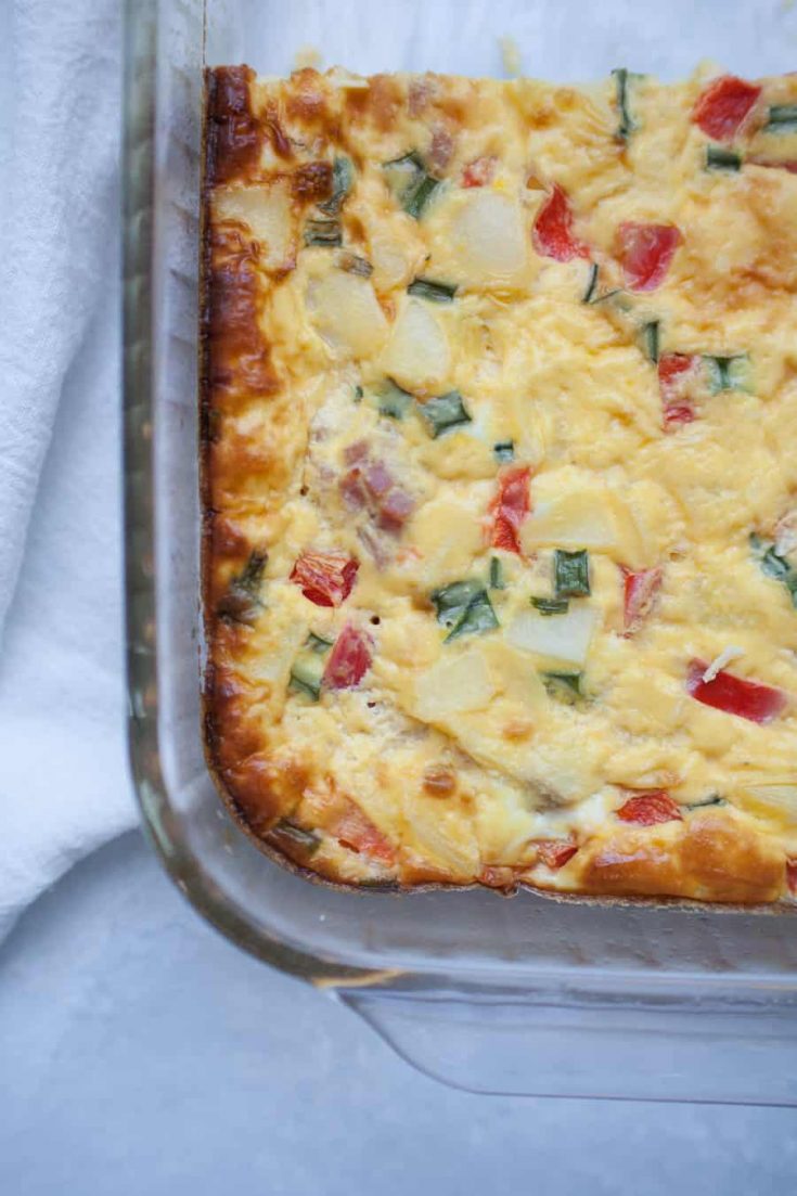 This Baked Breakfast Egg Casserole is the perfect breakfast for large groups or to meal prep for the week ahead! It's made with potatoes, peppers, eggs and milk and is so hearty! It has such simple ingredients but packs a ton of nutrition and taste into every serving. Make this ahead of time and have a hot breakfast ready to go all week or make this for a crowd- either way, you're sure to love it!?