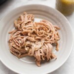 Slow Cooker Salsa Verde Pulled Pork is a flavorful slow cooker meal that is perfect for busy families! This pulled pork is made with salsa verde that you can buy at this store, so this is a two ingredient meal! Use this pulled pork for tacos, nachos, quesadillas or just by itself.?
