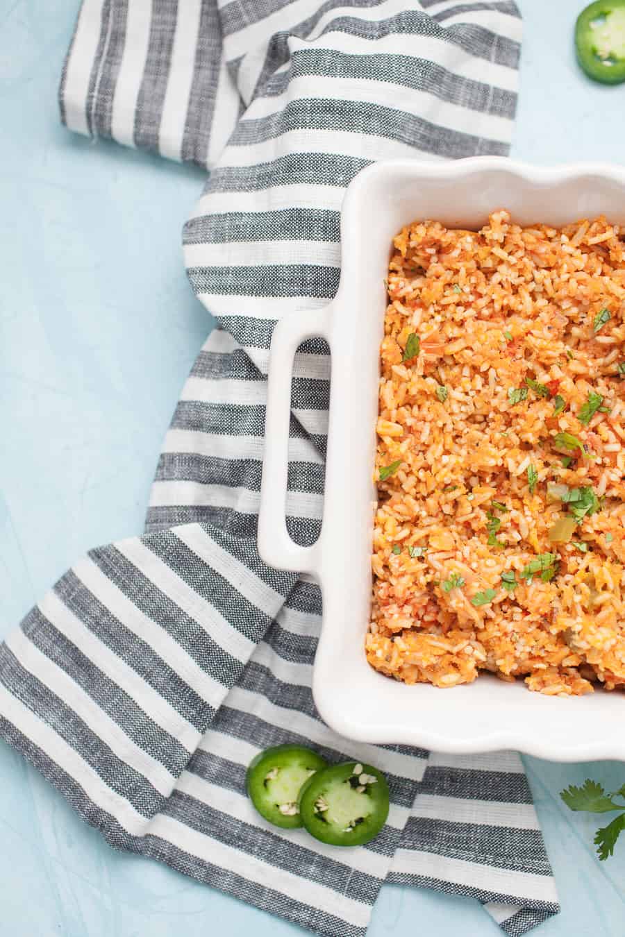 If you love Mexican food but want that restaurant quality food at home, this Traditional Mexican Rice is for you! This recipe is easy to make and bakes in the oven, which locks in the flavor and moisture that makes this recipe so delicious. You'll never go back to eating Mexican rice any other way!?