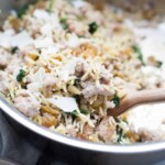 Spinach Turkey Orzo is a super easy meal that is packed with flavor for a perfect quick dinner option! This orzo dish has ground turkey, spinach, pine nuts, golden raisins and is topped with olive oil and shaved parmesan. The complexity of flavors in this dish is amazing, but you don't have to spend a long time getting this dinner together!
