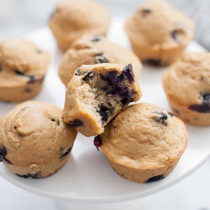 Healthy Lemon Blueberry Muffins are the perfect thing to kick off the school year. These muffins can easily be made ahead of time for the week and are perfect for serving to your kids. They'll love the sweet taste of the blueberries and you'll love that they're refined sugar free and healthy for them!