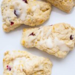 Homemade Fresh Cranberry Orange Scones are a treat you can make easily and these little treats are perfect shareable! Made with fresh cranberries, orange zest and orange juice, these cranberry scones will be a hit!