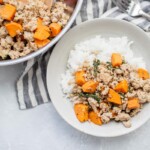 Stainless steel skillet with sweet potato and ground turkey mixture. Gray plate with sweet potatoes, ground turkey and rice.