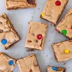 m&m cookie bars on a blue background