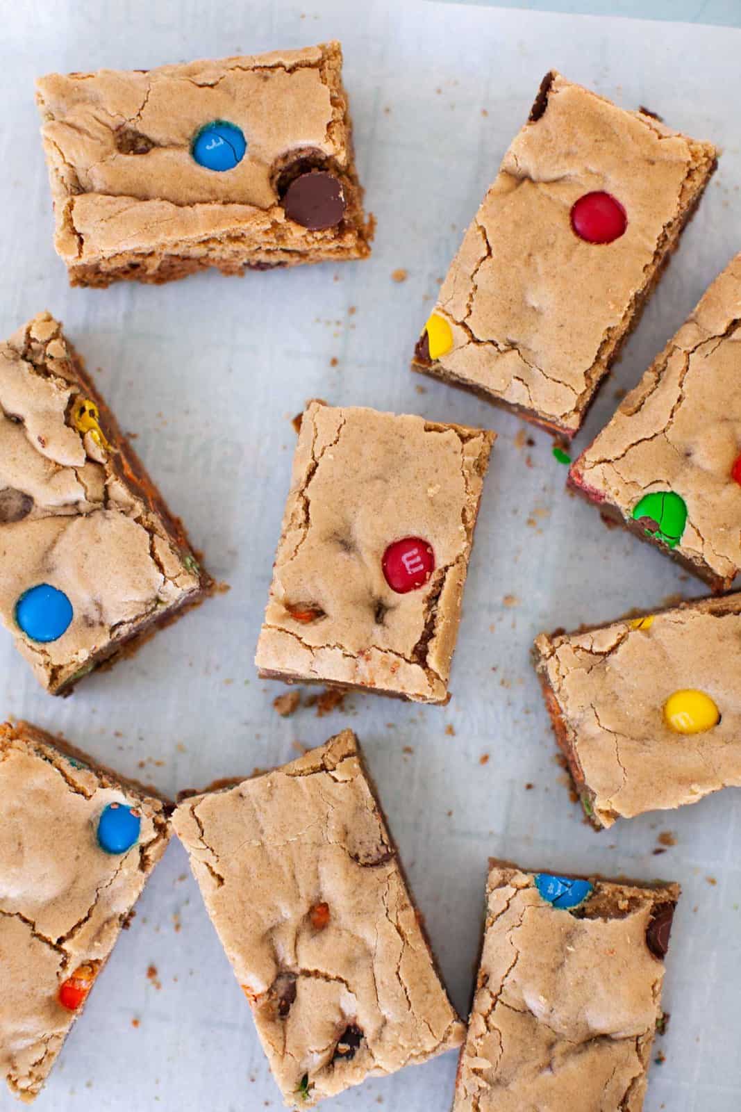 m&m cookie bars on a blue background