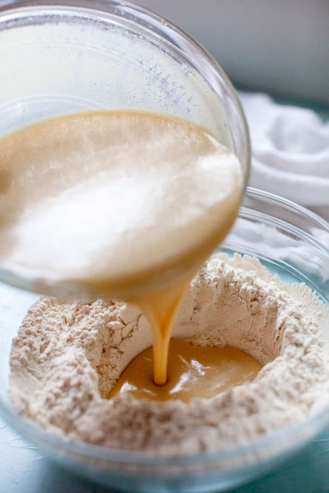 pouring wet into dry ingredients