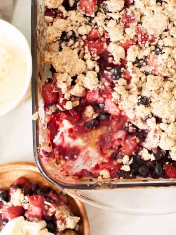 berry crisp with a scoop removed