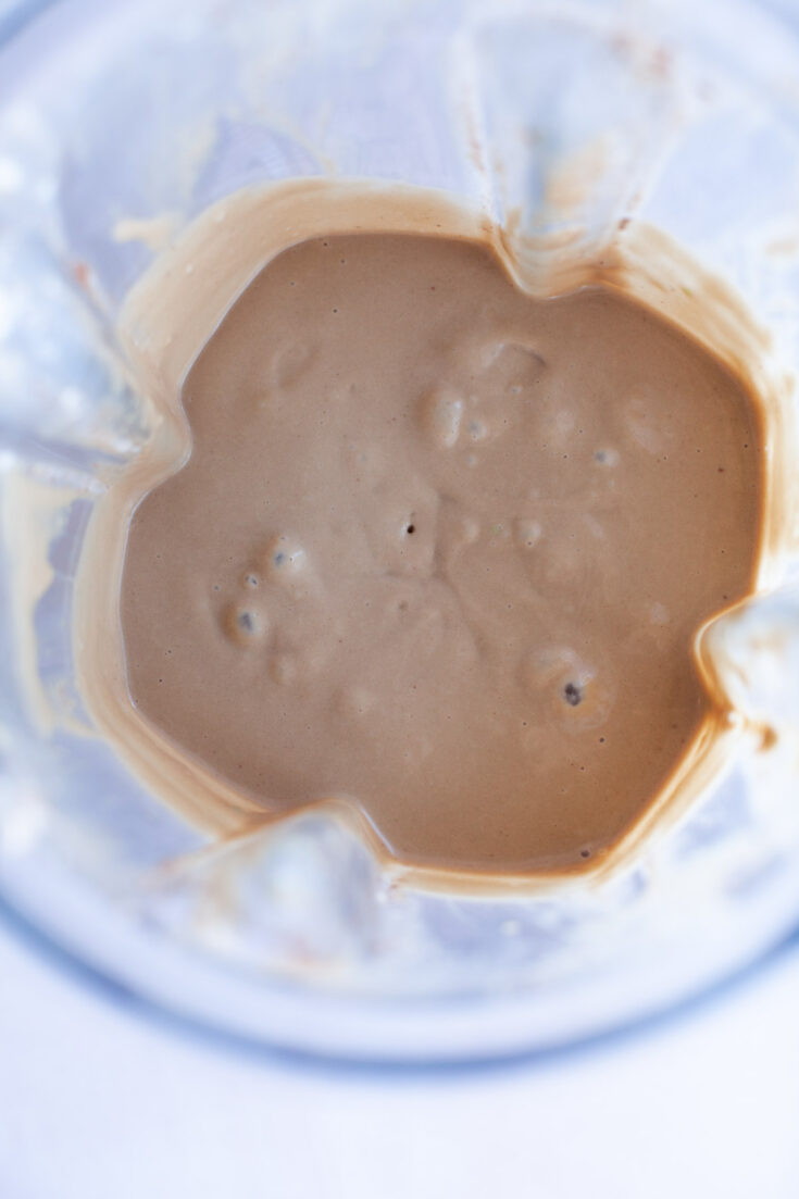 Chocolate smoothie in a blender.