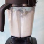 a blender running with soap and water in it