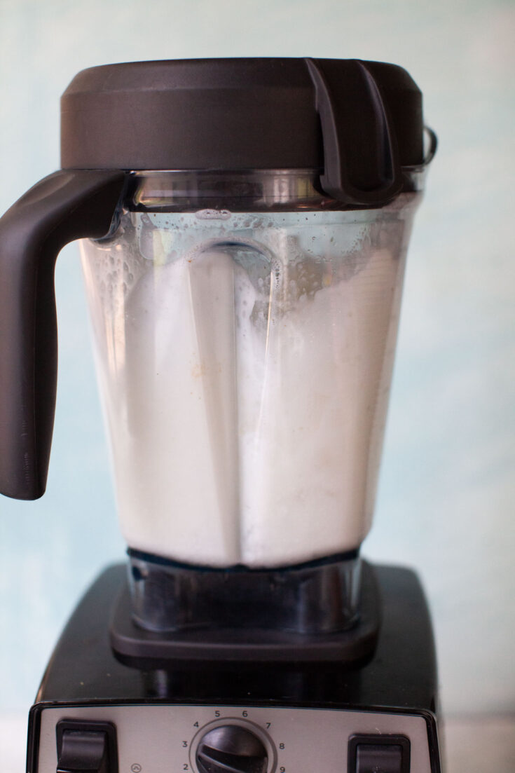 a blender running with soap and water in it