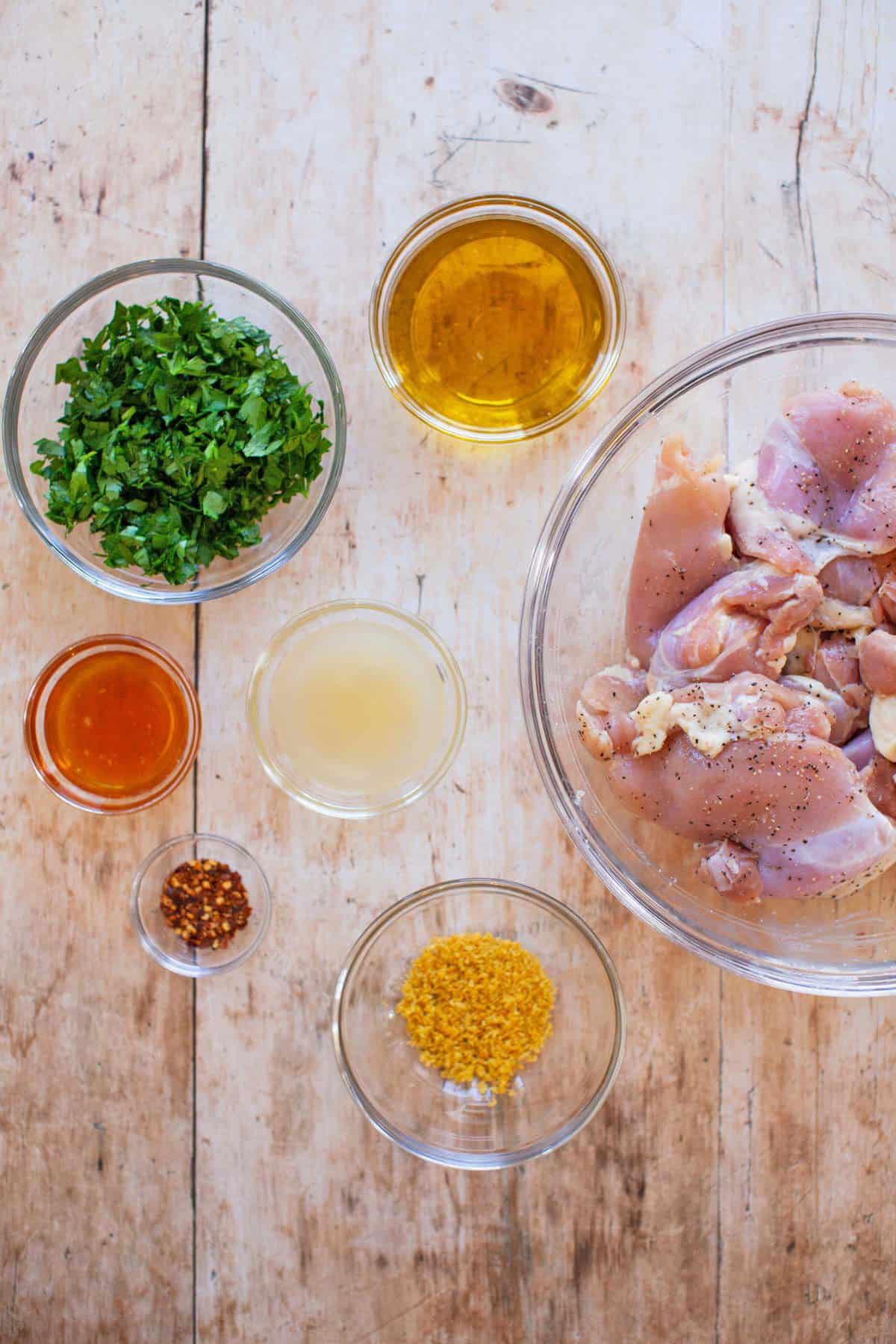 lemon chicken marinade ingredients on a wooden table