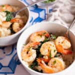 bowls of shrimp risotto on a dinner table