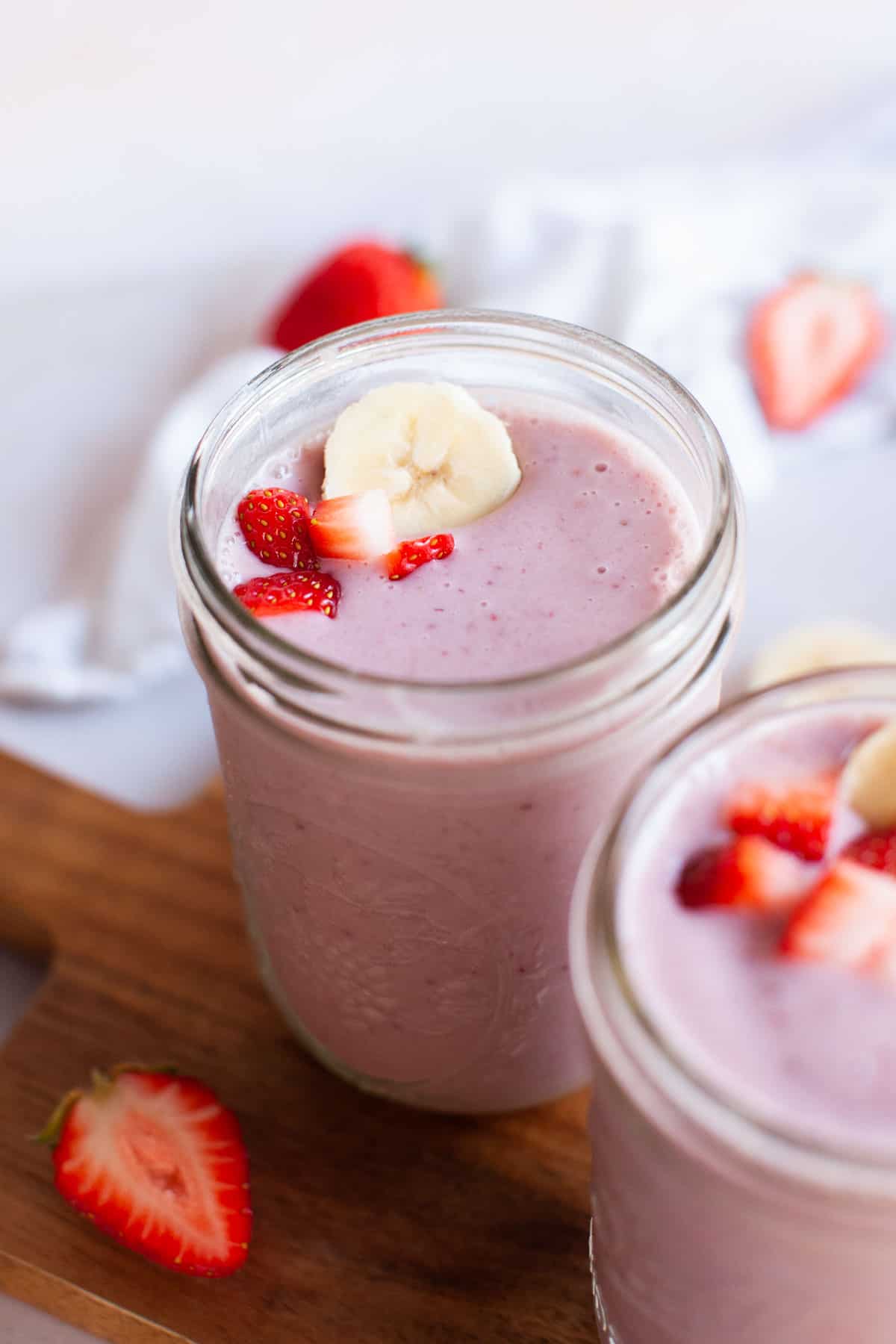 Beauty shot of strawberry smoothie jar.