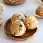 Close up of muffins in a shallow acacia bowl.