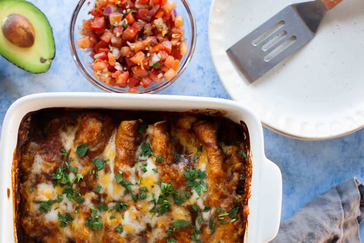 Horizontal photo of chicken enchiladas.