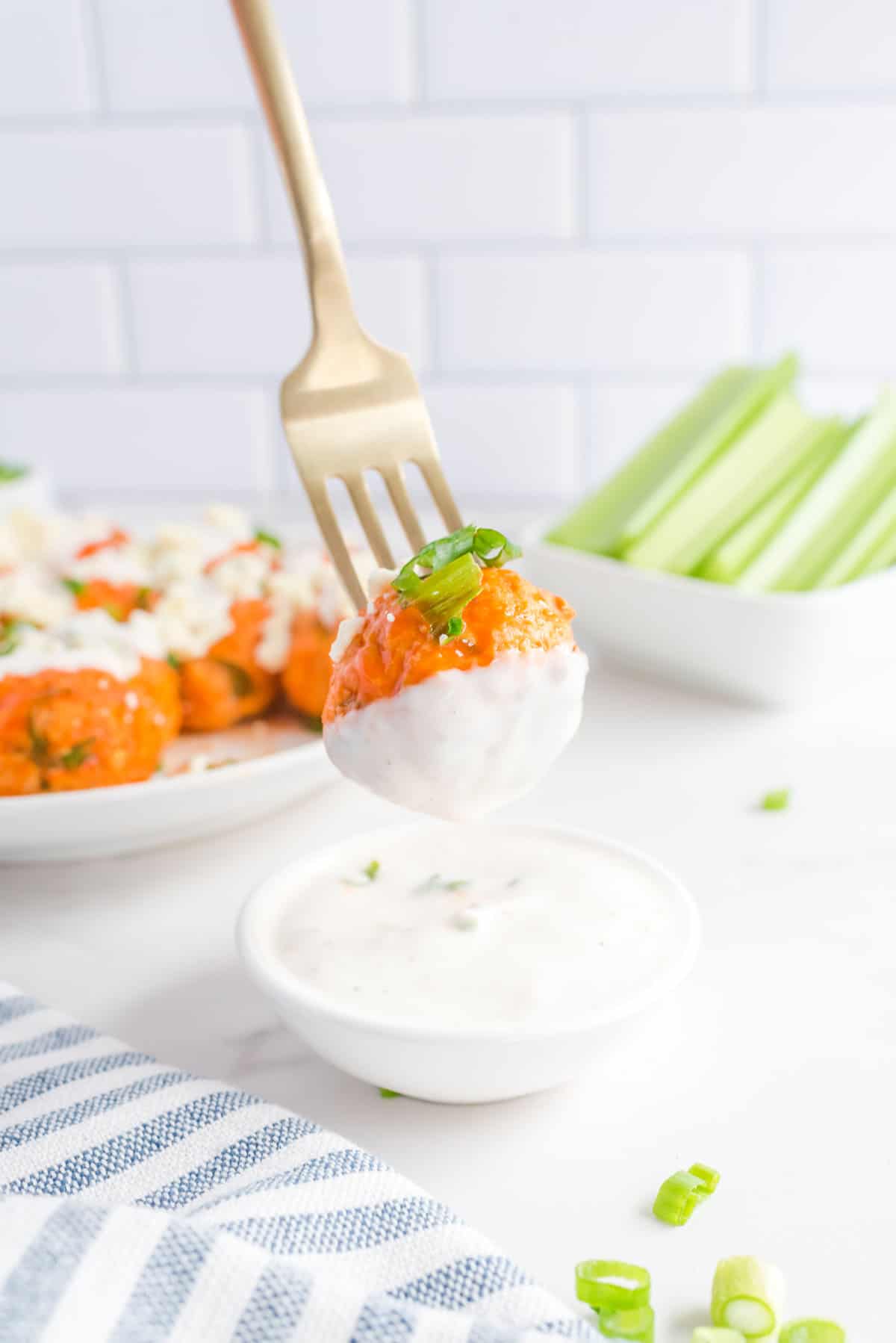 Chicken meatball dipped in ranch dressing.