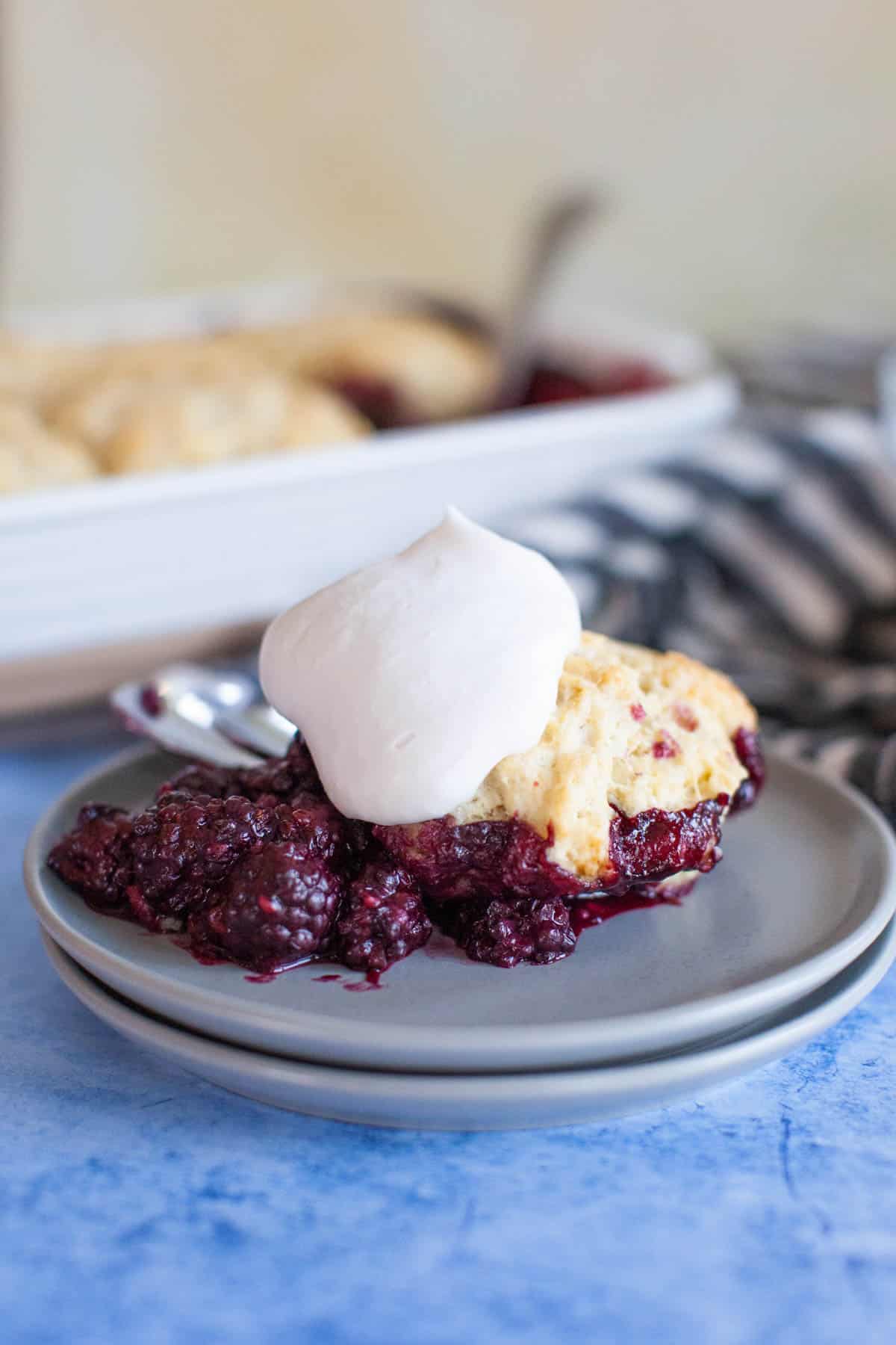 Coconut cream on top of blueberry cobbler.