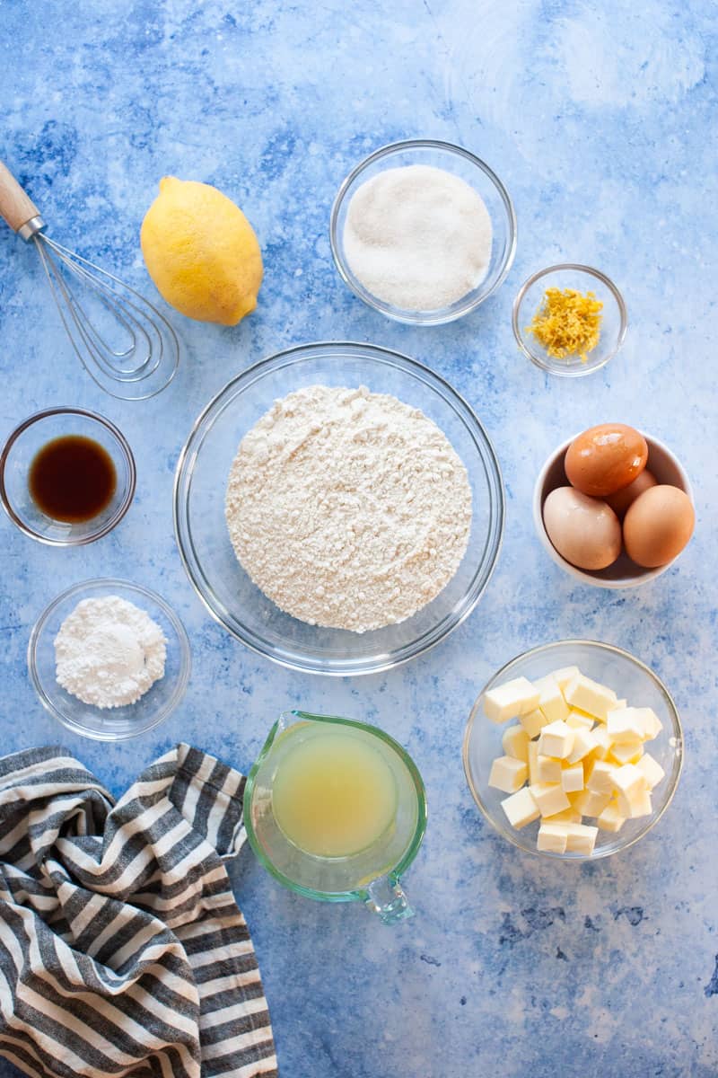 lemon bar ingredients measured in bowls