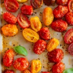 roasted tomatoes on baking sheet