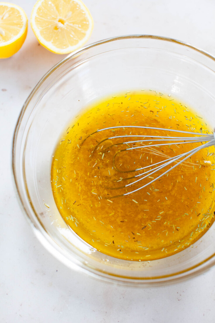 Dijon mustard, spices, honey, vinegar and lemon juice whisked together.