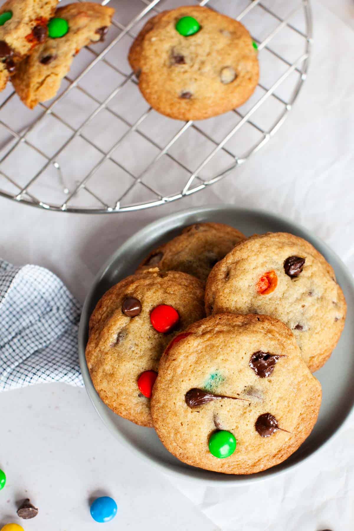 M&M cookies on a small gray plate.