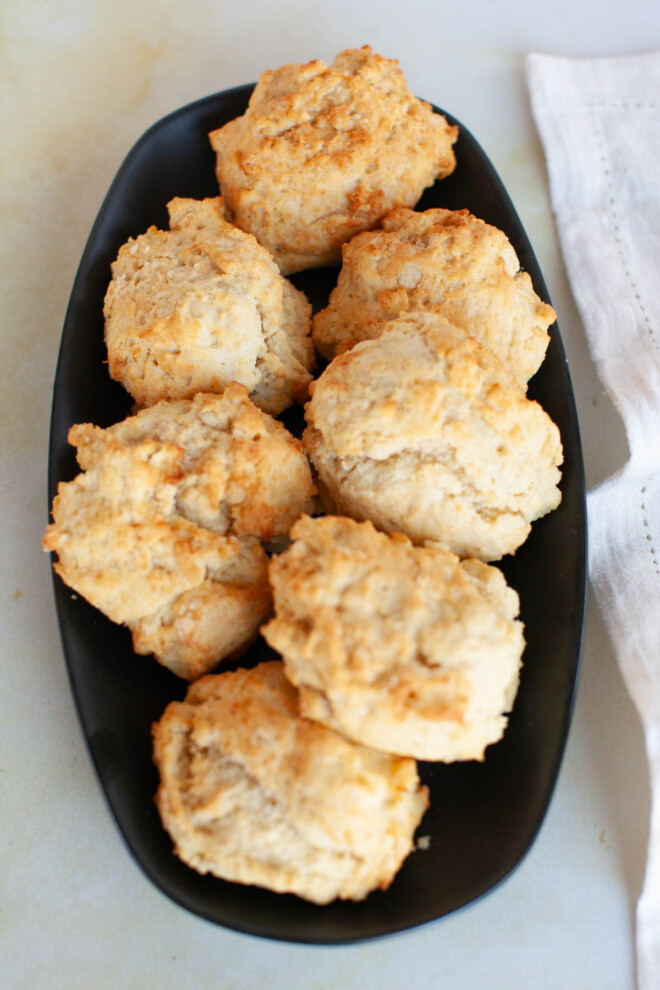 Easy drop biscuits on a black serving tray.