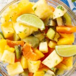 A bowl of Mexican fruit salad on a table.