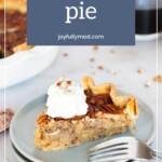 Pecan pie recipe with whipped cream on a plate.
