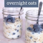 Quick blueberry overnight oats in jars with spoons.