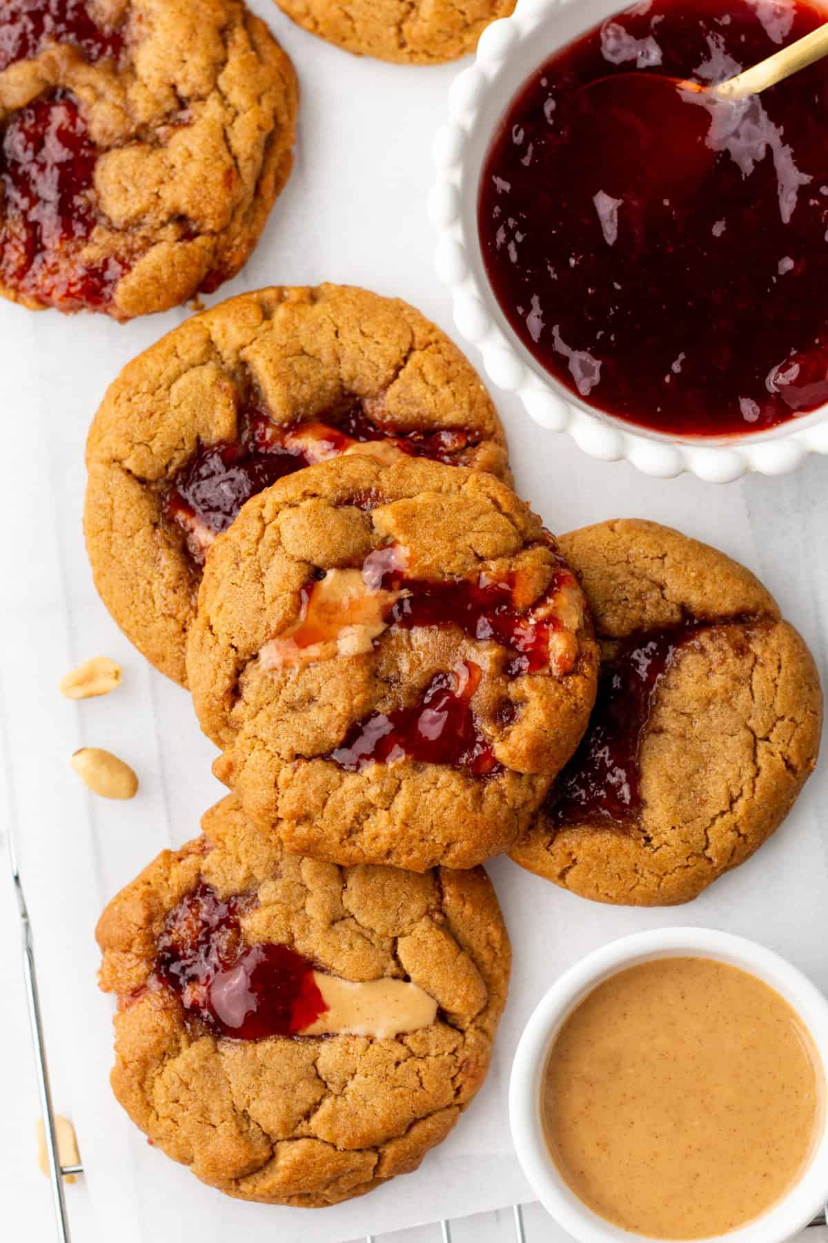 https://joyfullymad.com/wp-content/uploads/2024/12/Peanut-Butter-Jelly-Cookies-24.jpg?utm_source=chatgpt.com