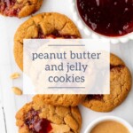 Peanut butter and jelly cookies cozy up around a bowl of jelly, with a small dish of peanut butter on the side, creating a delightful scene reminiscent of ginger cookies in holiday spreads.