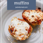 Two delicious turkey meatloaf muffins topped with melted cheese sit invitingly on a white plate.