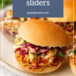 A tempting plate of BBQ chicken sliders, crowned with crisp coleslaw, stands invitingly beneath the website's name.